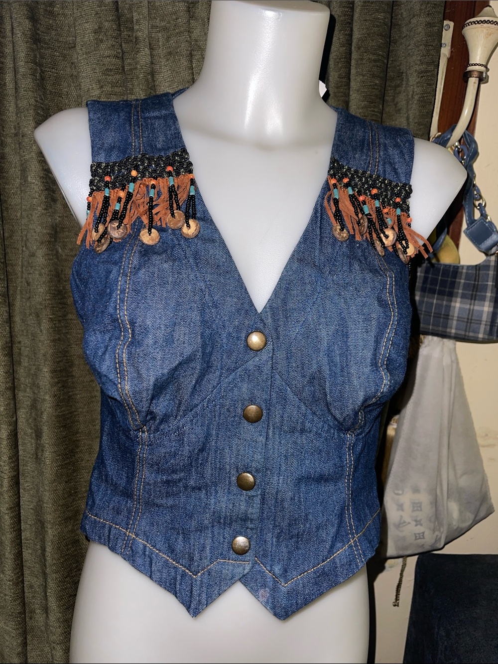 Vintage Denim fringe vest
see measurements